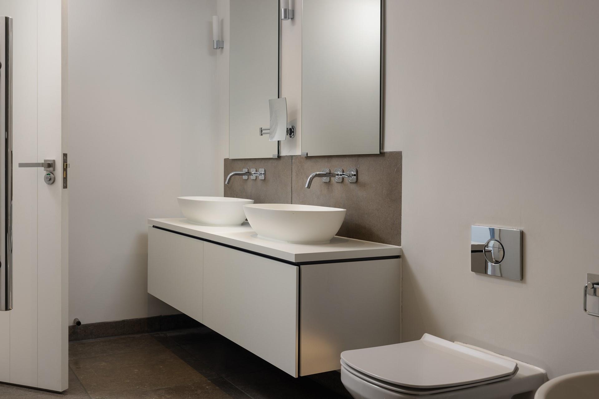 His and hers sinks make it a breeze getting ready in the mornings.