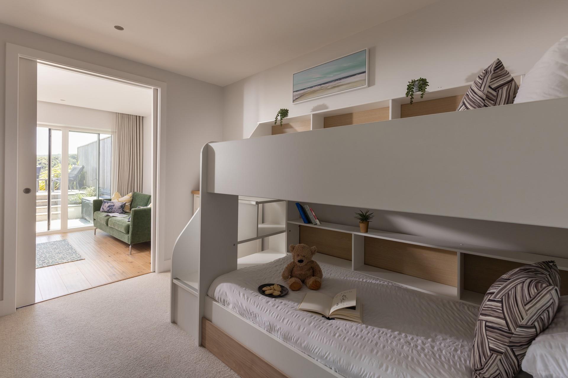 The bunk bedroom is perfect for the little ones, with an adjacent snug and access to the garden.