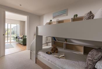 The bunk bedroom is perfect for the little ones, with an adjacent snug and access to the garden.