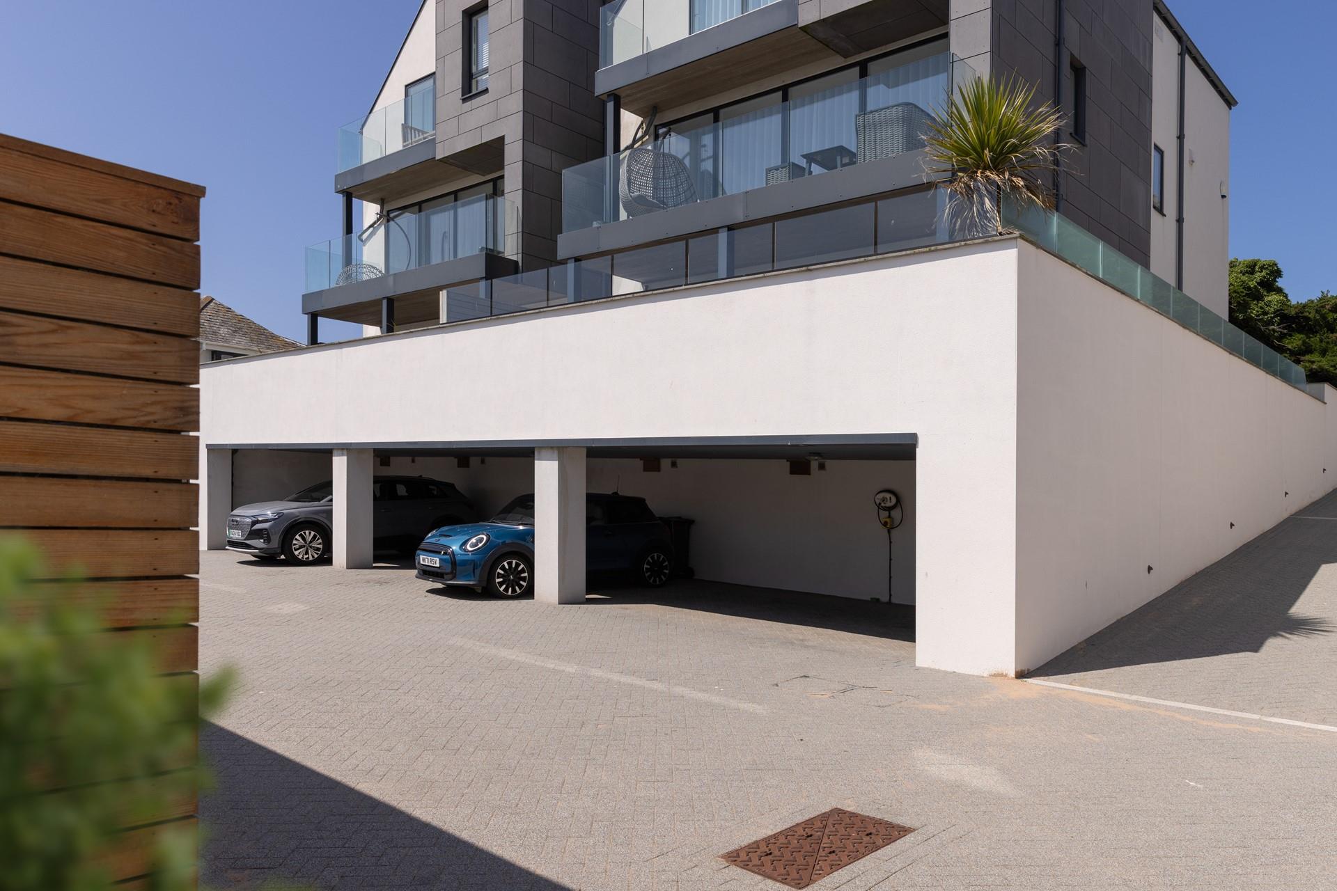 There are two private parking spaces in the car port.