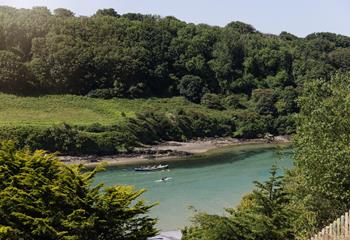 The estuary is a popular spot at high tide with swimmers, rowers and paddleboarders.