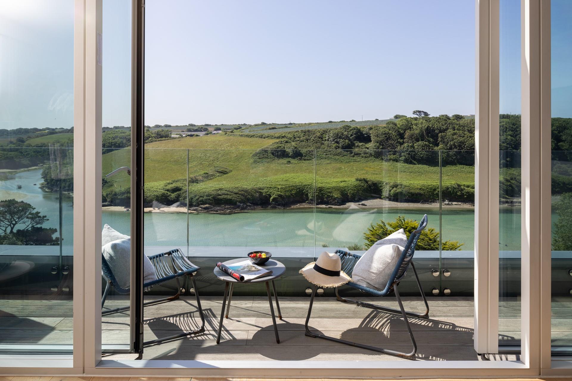 While away the hours on the balcony, admiring the serene view.