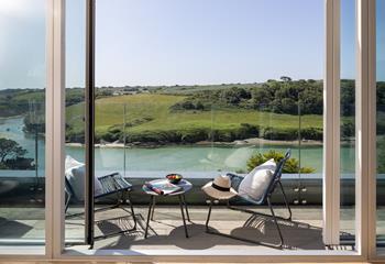While away the hours on the balcony, admiring the serene view.