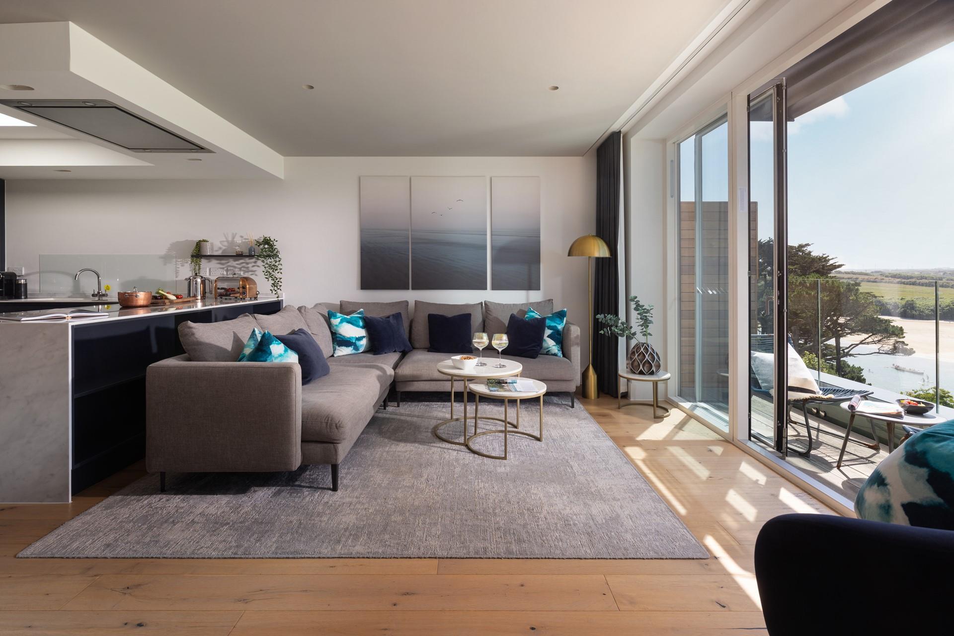 The open plan living area is a beautiful space for relaxing by the sea.
