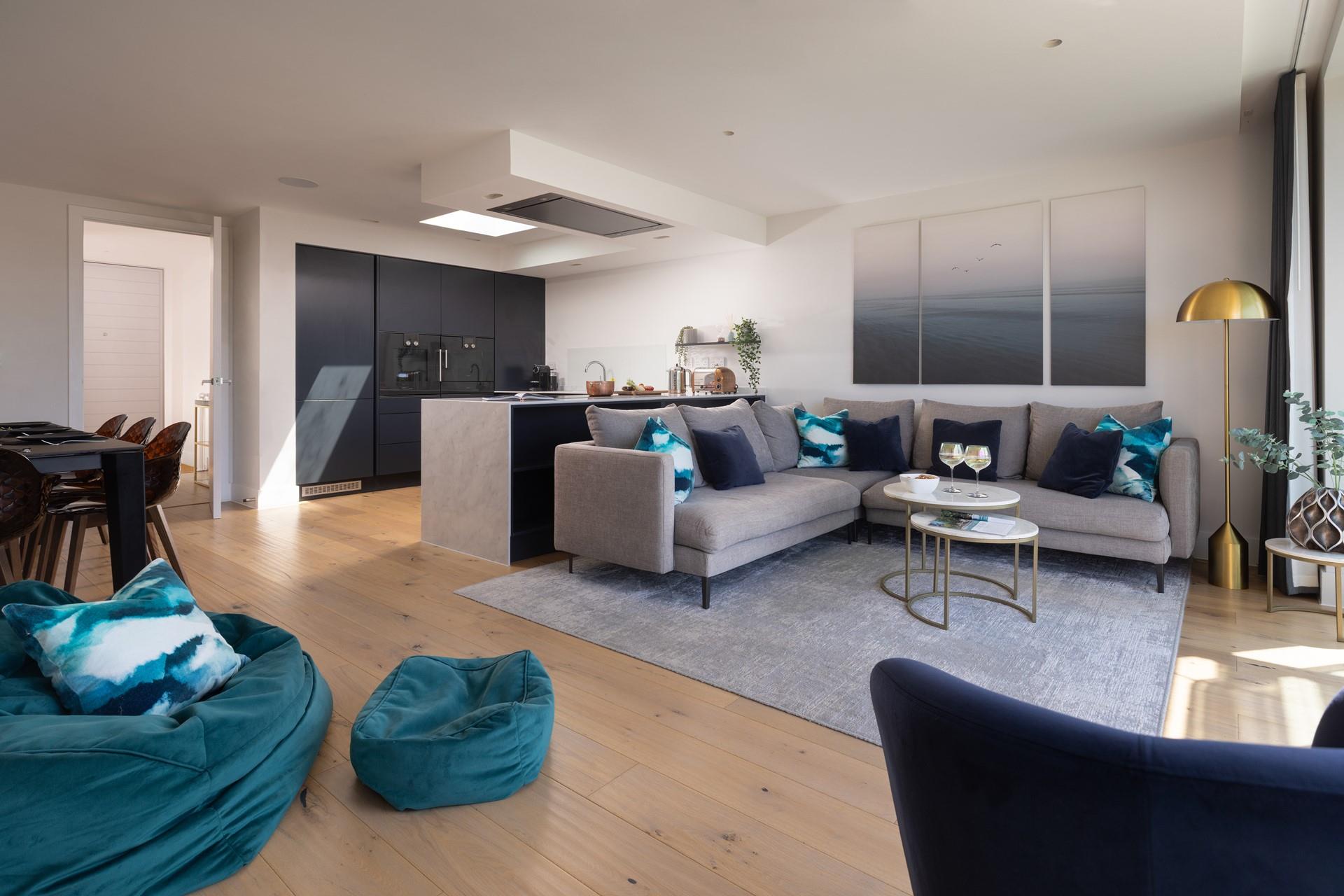 Deep blues and greens reflect the majestic waterside location.