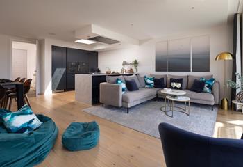 Deep blues and greens reflect the majestic waterside location.