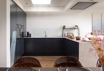 The foodie in the family will love cooking in the contemporary kitchen, and exploring Newquay's tasty food spots.
