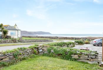 Sit out in the front garden and take in the breathtaking views of Widemouth Bay.