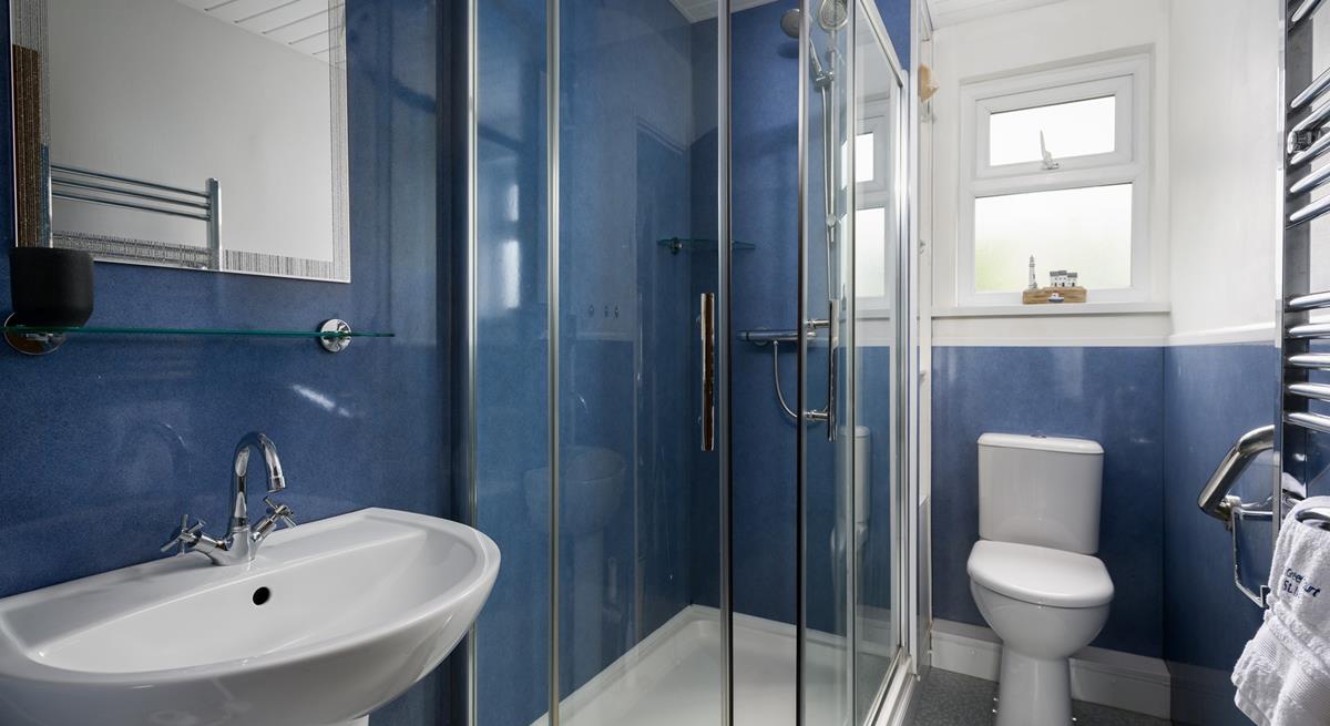 Wash off sandy toes in the shower after a day on Porthmeor beach.