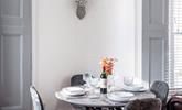 The dining table is a stylish place to spend quality time at meal times. - Thumbnail Image