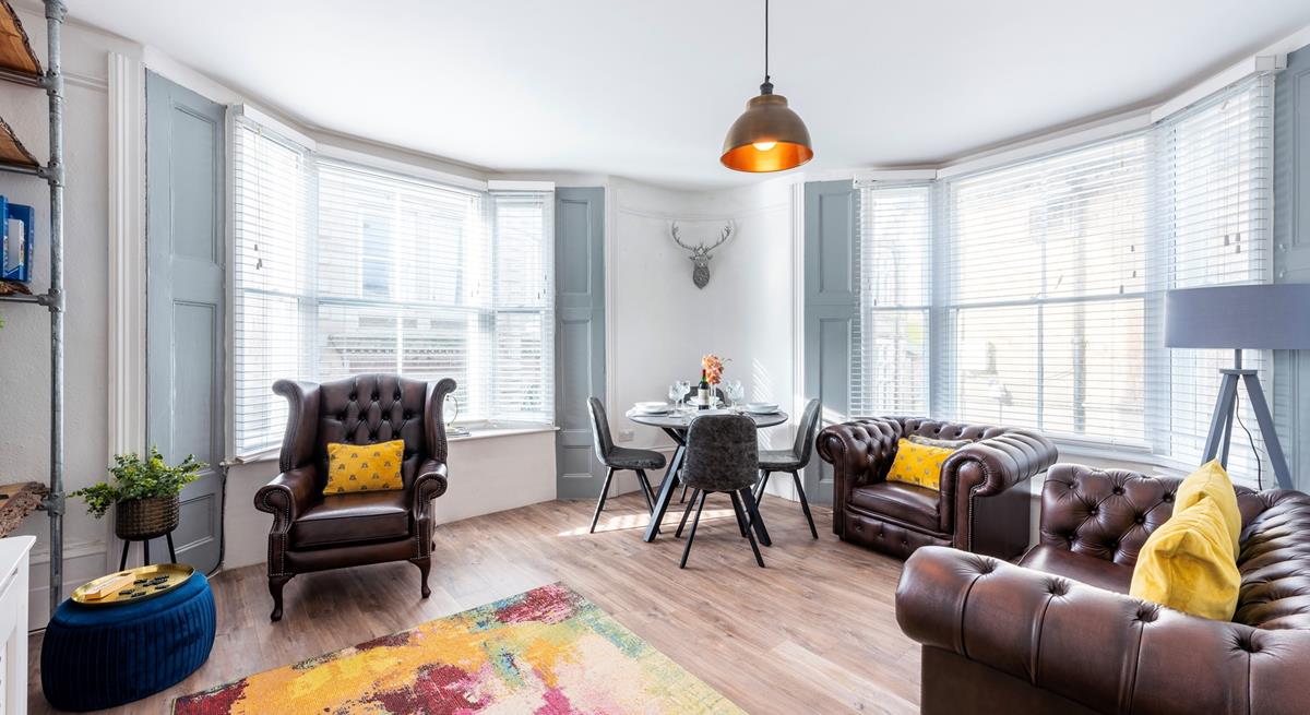 Bright and colourful, the sitting room is the perfect base to come back to after beach days.