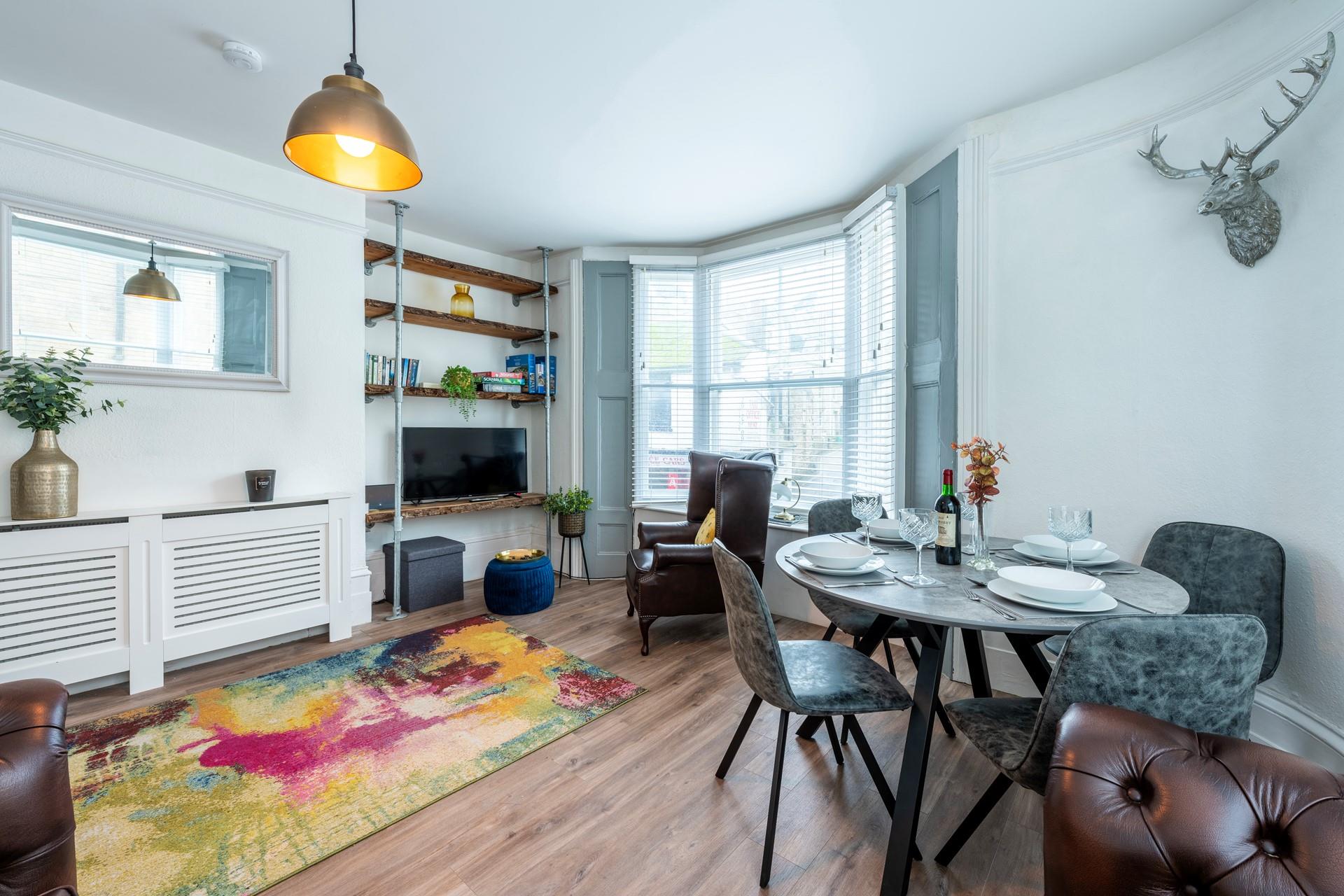 The sitting room is spacious and light for relaxing evenings spent with family or friends.