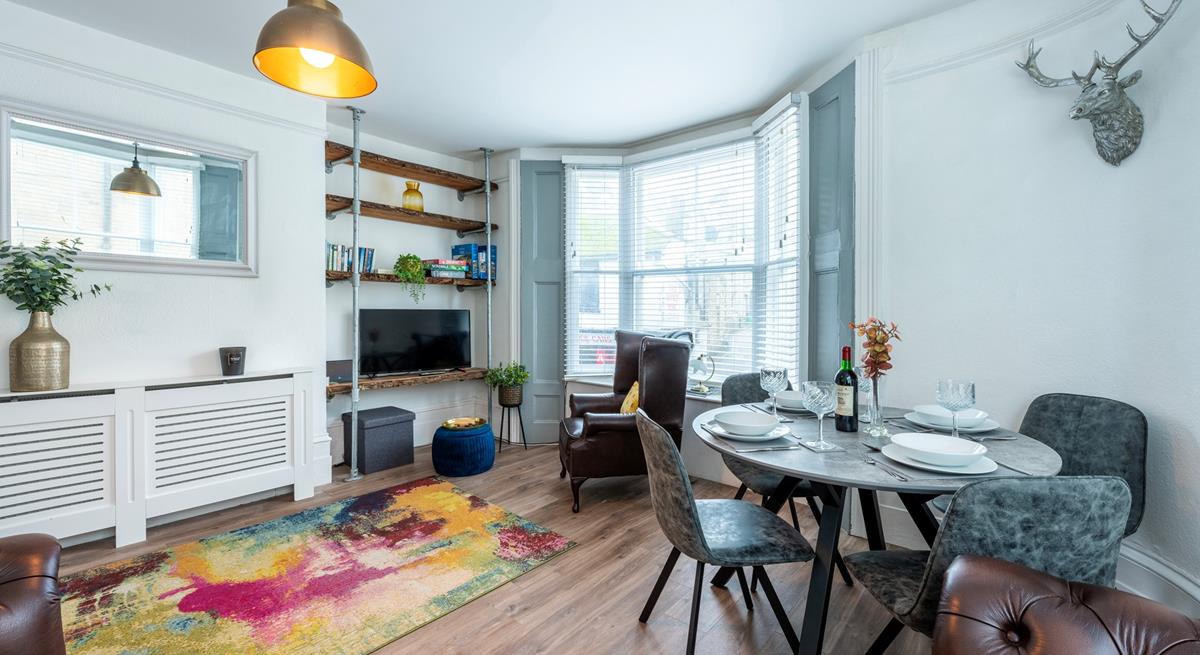 The sitting room is spacious and light for relaxing evenings spent with family or friends.