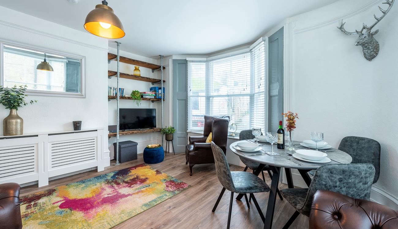 The sitting room is spacious and light for relaxing evenings spent with family or friends.