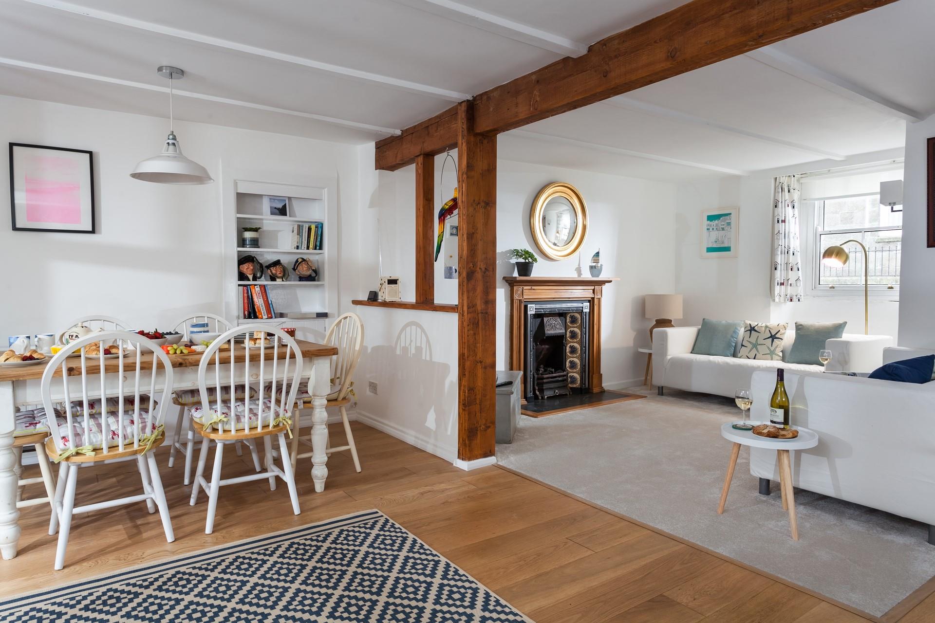 The cottage is bursting with charm with its exposed beams.