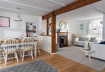 The cottage is bursting with charm with its exposed beams.