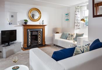 Sink into the sumptuous sofas in front of the gas fire and unwind each evening.