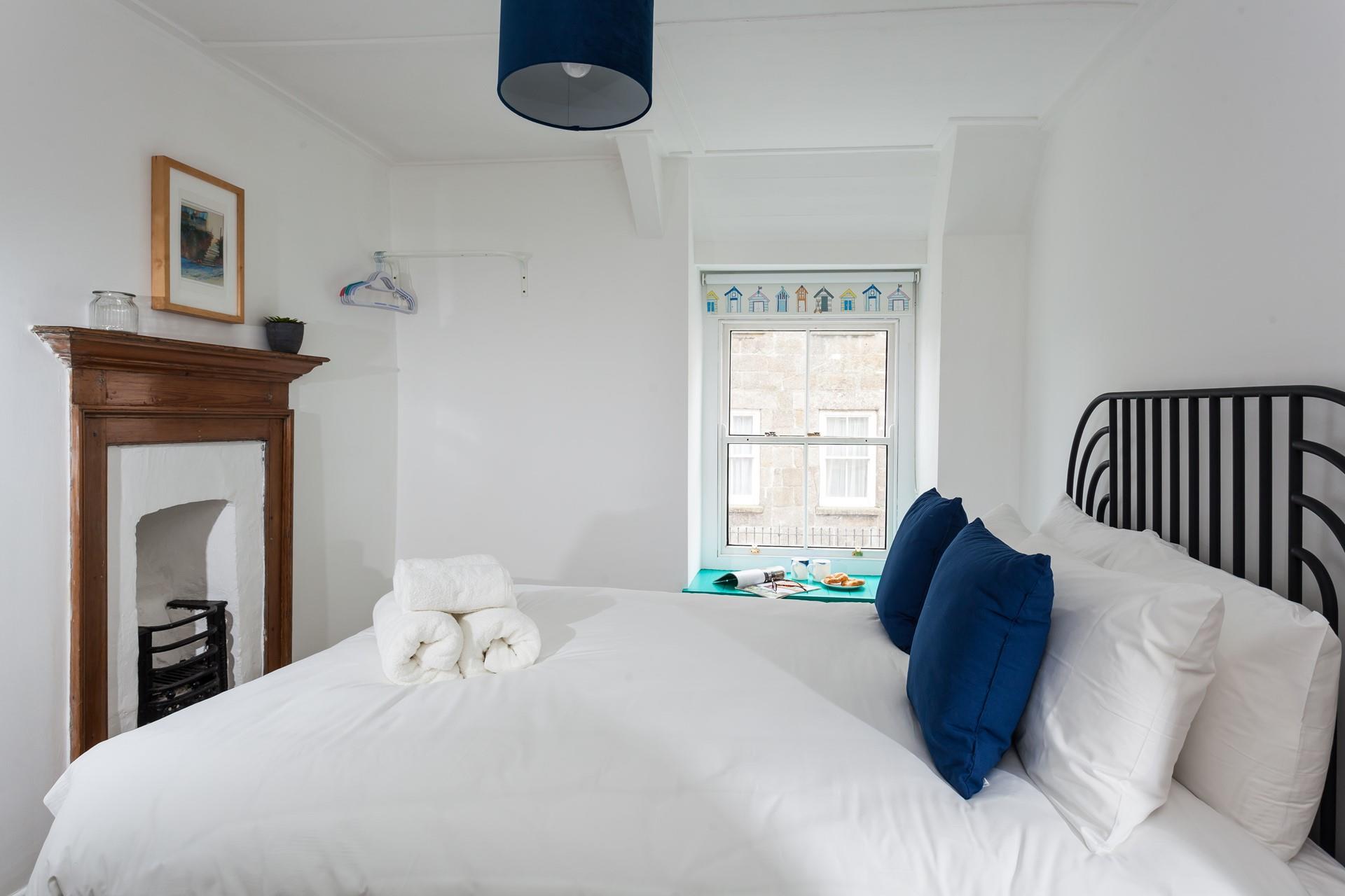 The blue decor reflects the close proximity to the sea.