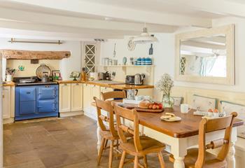 The homely kitchen allows the whole family to enjoy tasty dinners together.