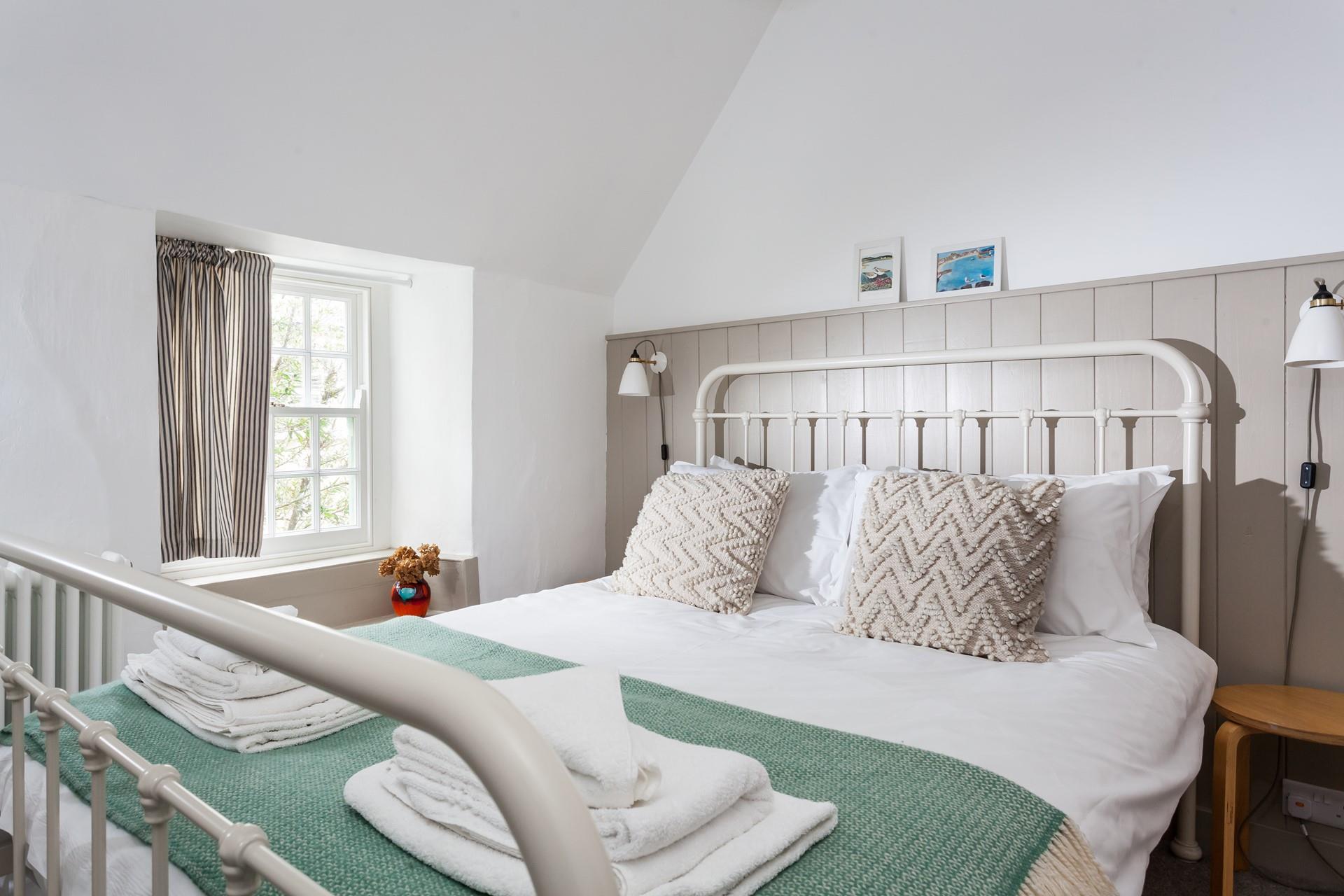 The spacious king size bed provides the ultimate cosy night's slumber.