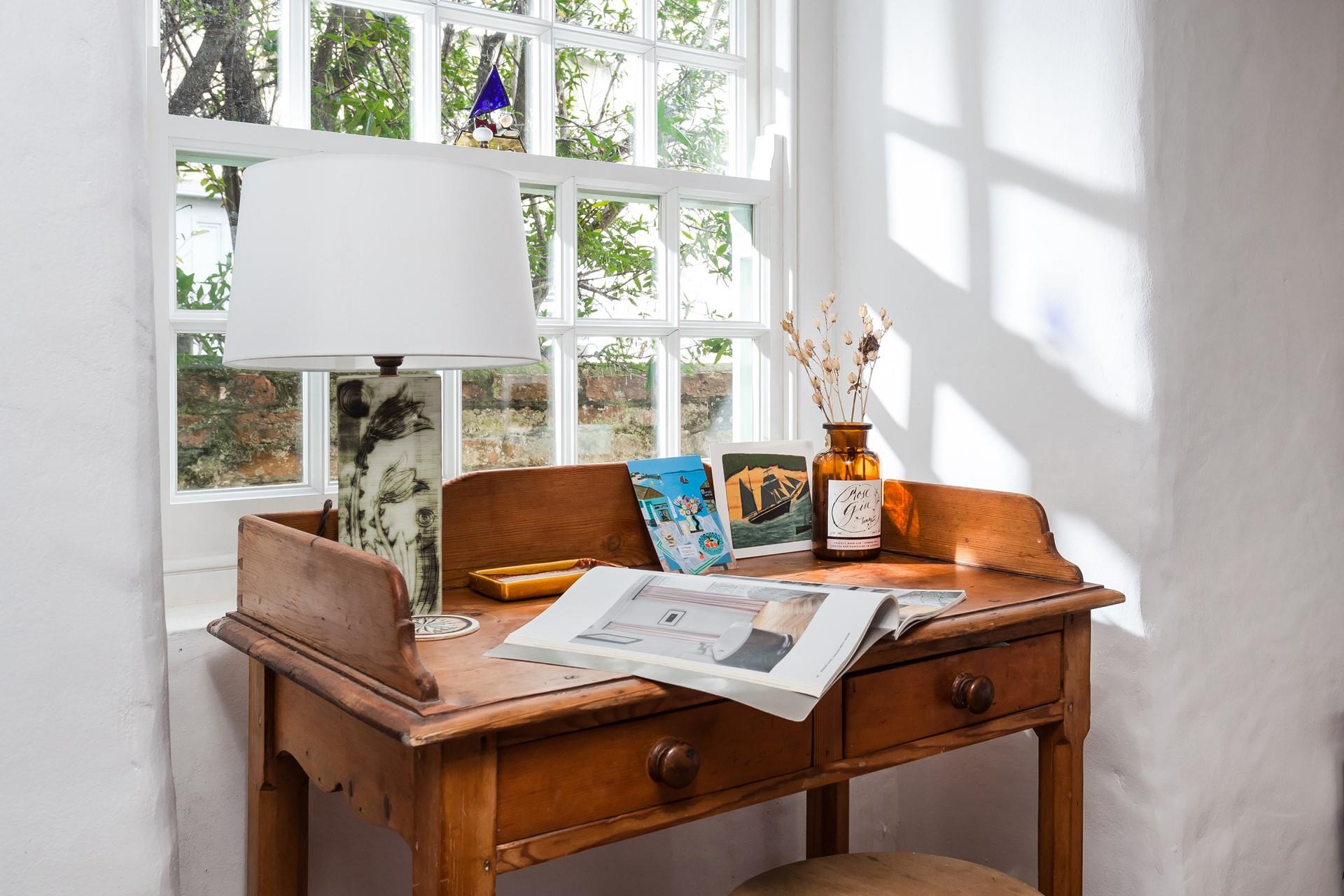 The desk area is perfect for catching up on emails while you're away.
