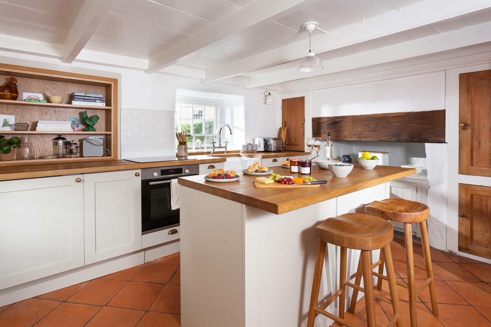 The cottage-style kitchen is a dream to cook a family feast in.