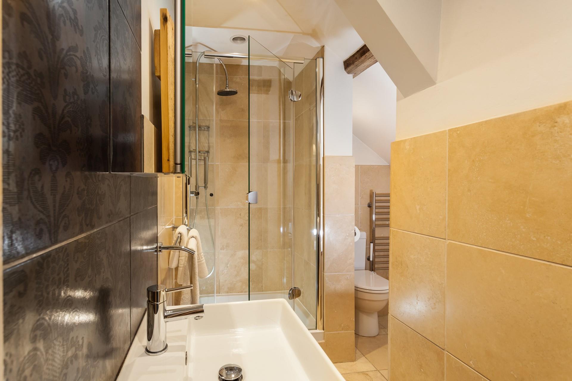 Wash off sandy toes in the rainfall shower after beach days.