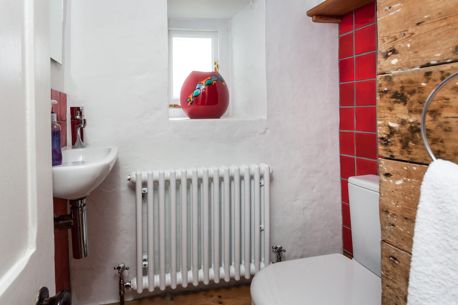 There is an additional WC in the cloakroom.