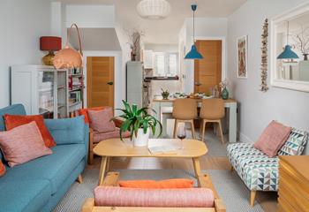 The sociable living area has all the comforts of home.