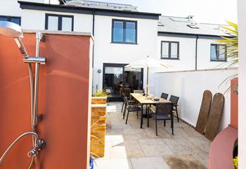 A cold outdoor shower is an ideal addition for washing sand off boards and wetsuits. 