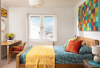 Another comfortable bedroom, complete with a desk for anyone who needs to work whilst away. 