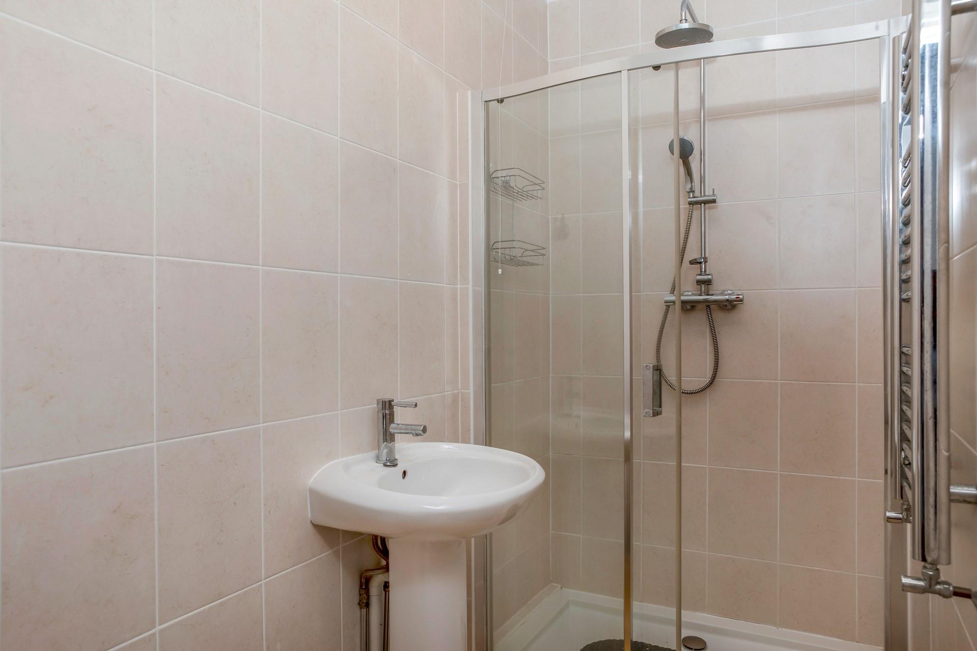 The invigorating rainfall shower will be a treat after a day on the beach.