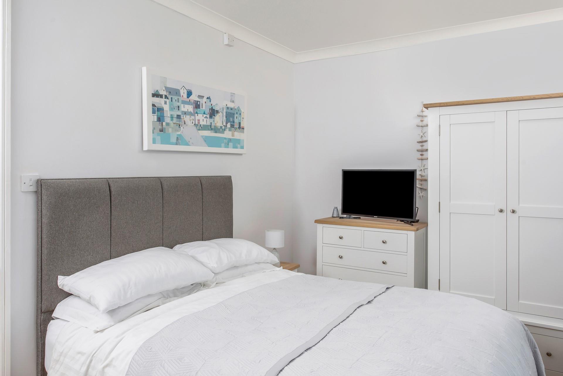 Drift off into a dreamy night's slumber in the king size bed.