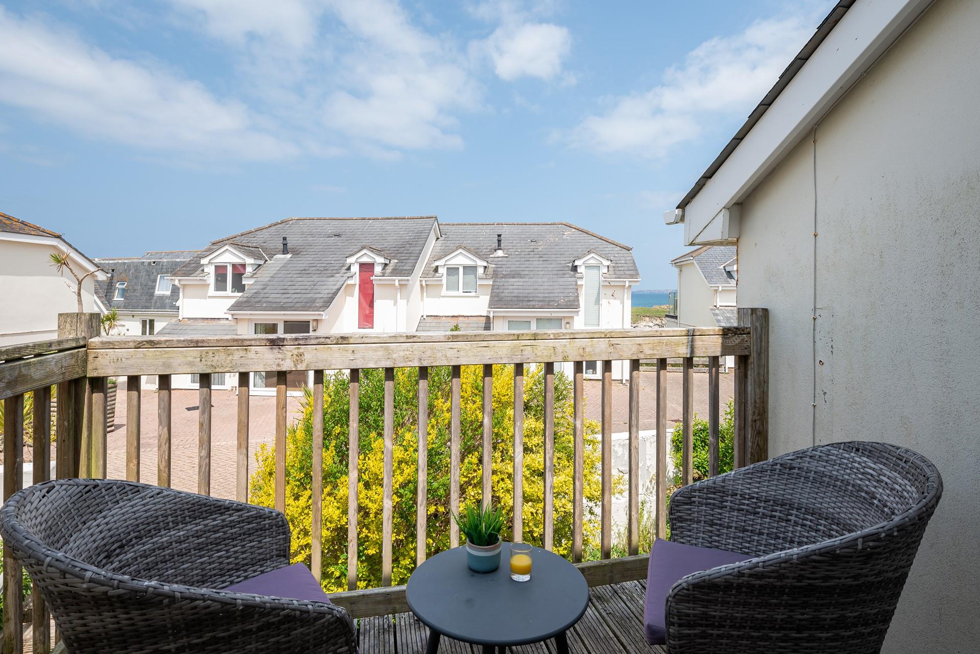 Soak up the sun on the balcony while enjoying the sea glimpses.