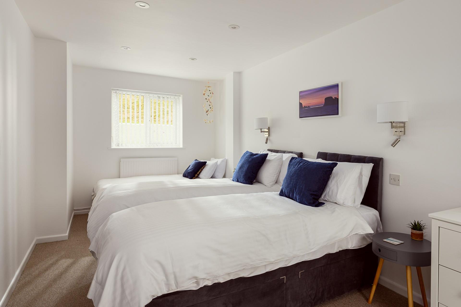 Bedroom 2 has twin beds and a single bed perfect for the little ones.