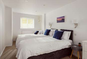 Bedroom 2 has twin beds and a single bed perfect for the little ones.