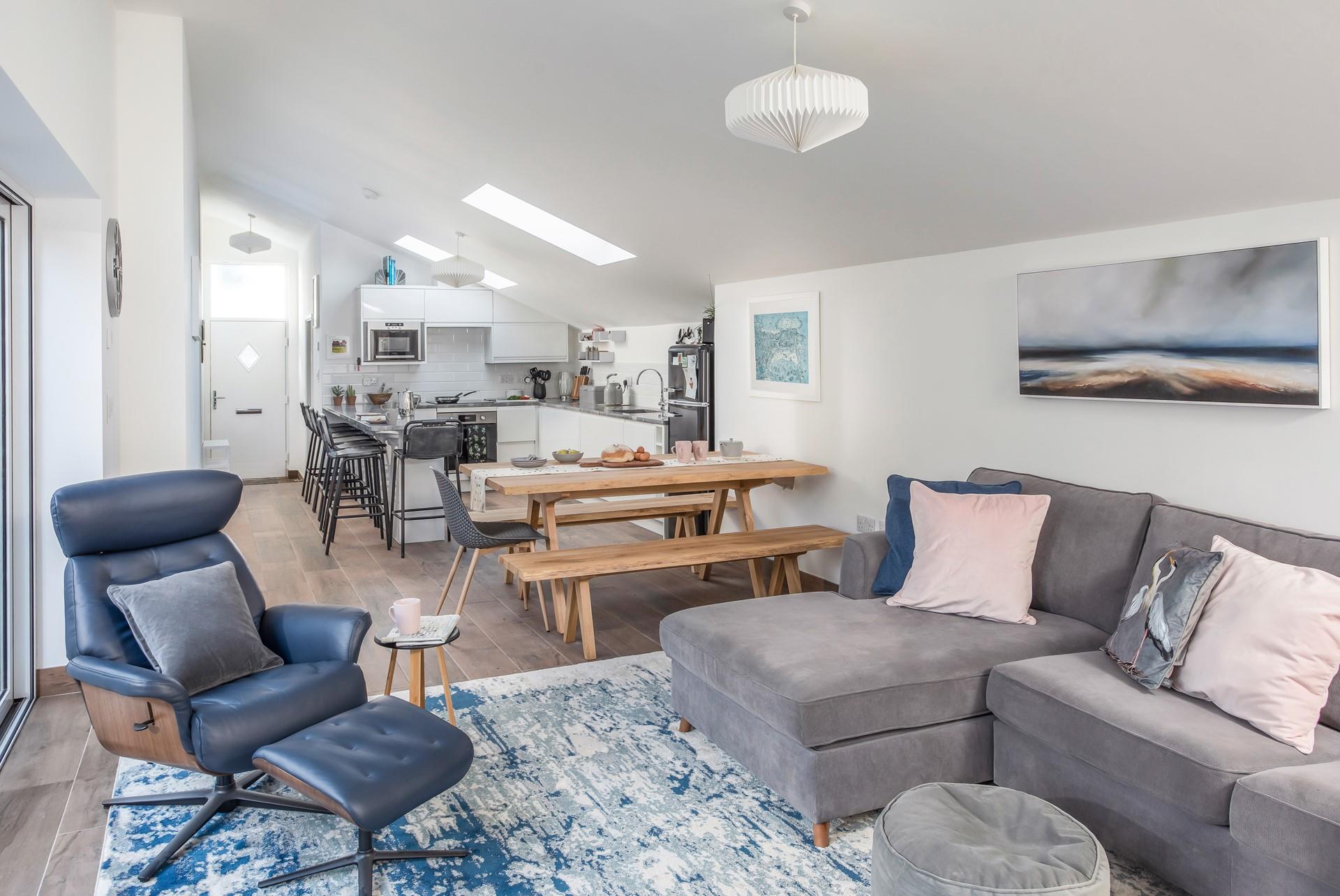 The living space is filled with light and is the perfect space to unwind.