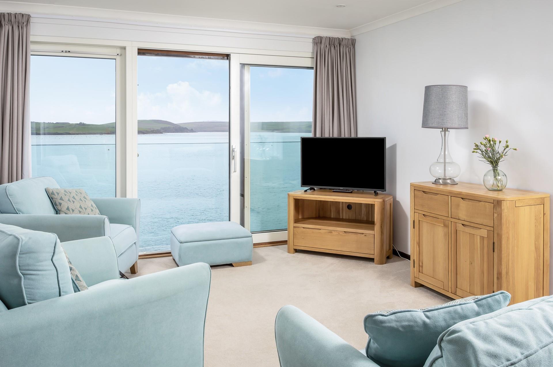 Relax in the evenings with a good show on the TV, listening to the waves outside the door.