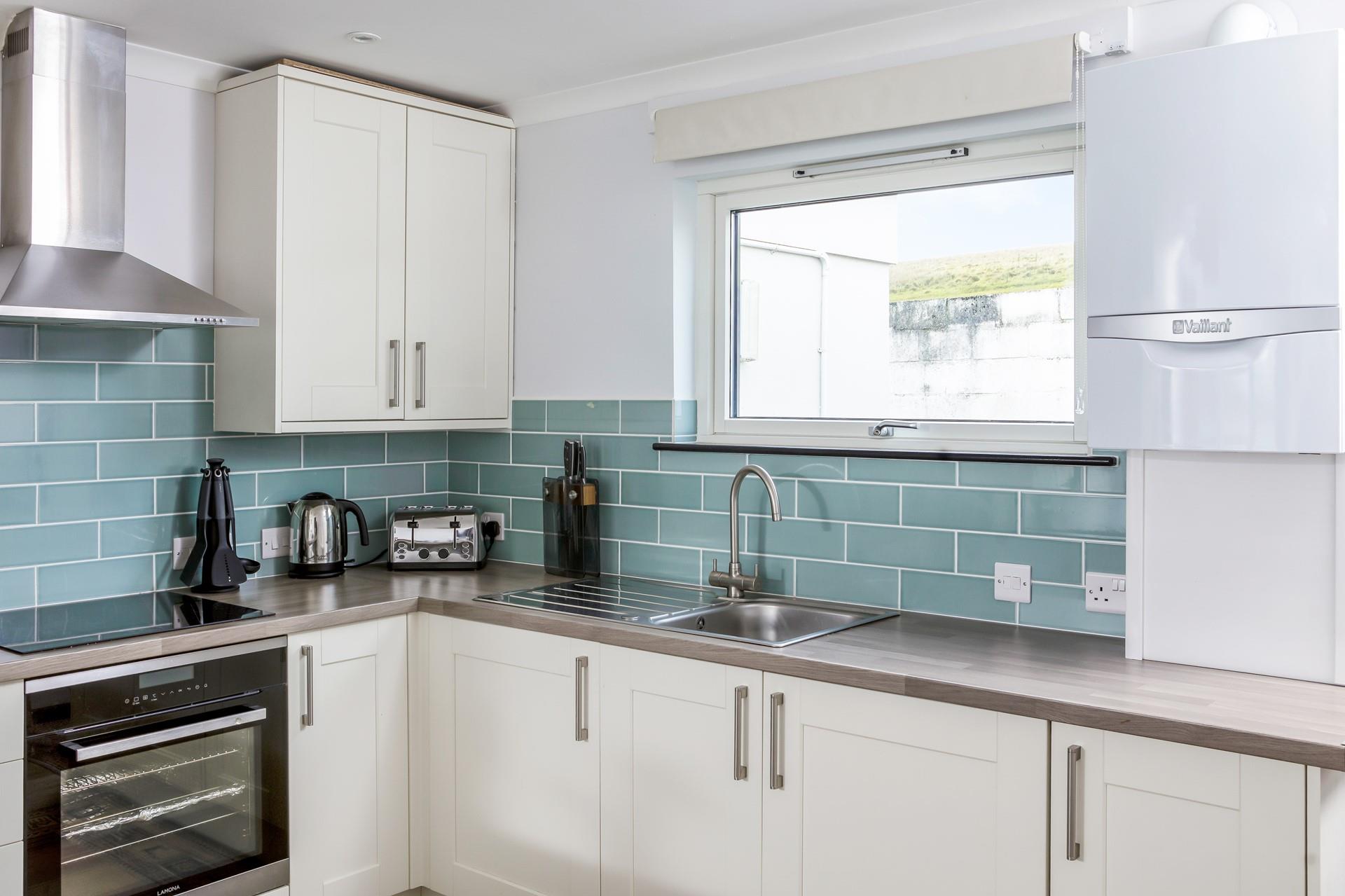 Fully equipped, the kitchen is perfect for cooking hearty breakfasts and delicious dinners.
