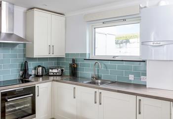 Fully equipped, the kitchen is perfect for cooking hearty breakfasts and delicious dinners.