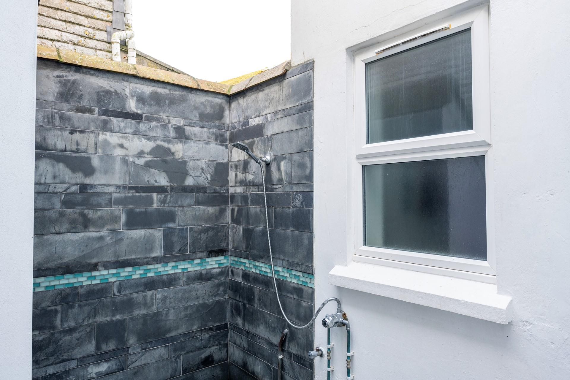 The hot outdoor shower is perfect for washing down wetsuits and sandy toes.