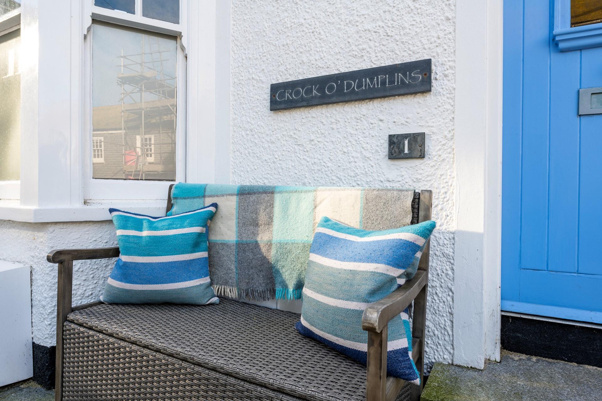 Take your morning coffee out to the front bench to sip in the morning sun.