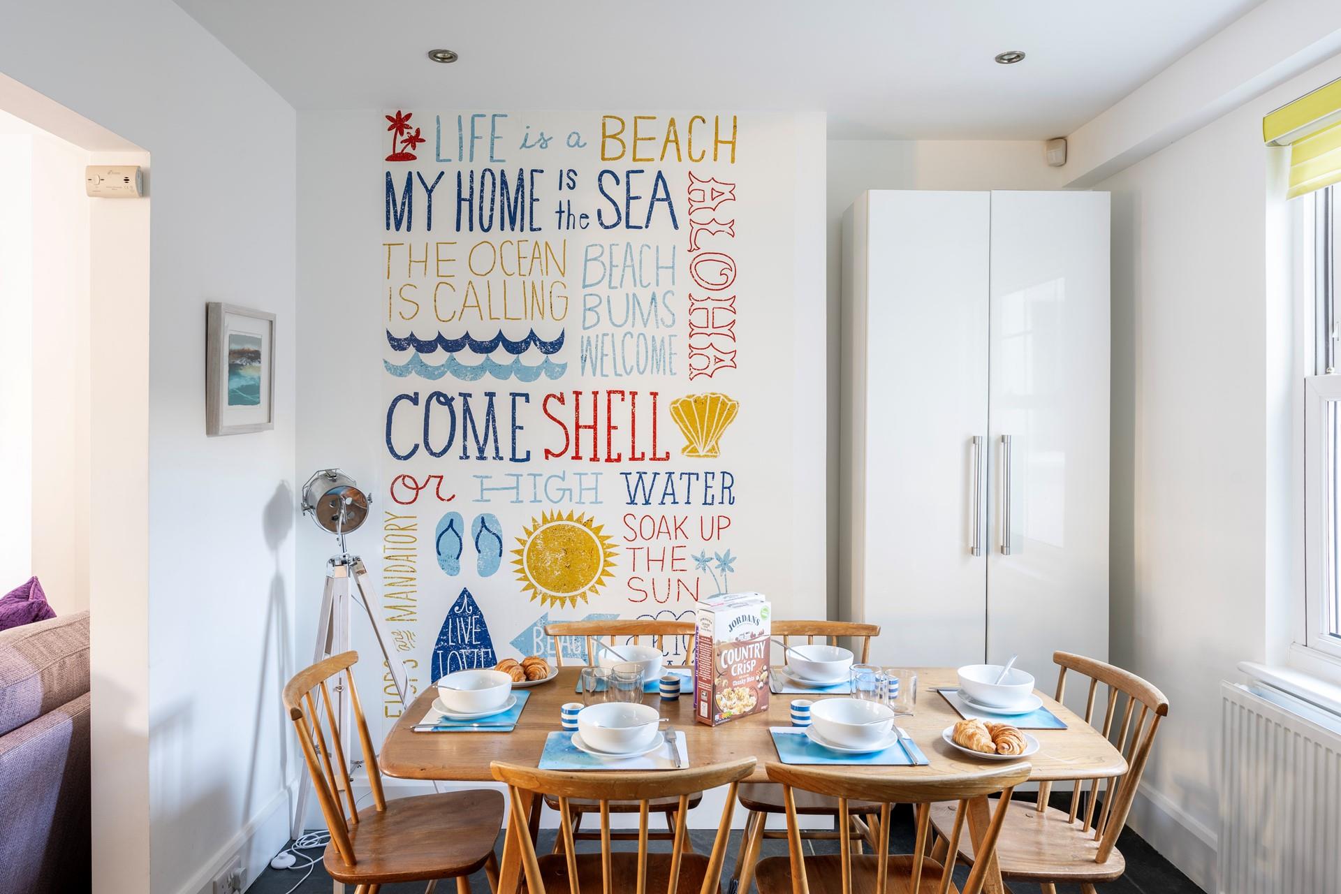 We love the beach-inspired wall art!