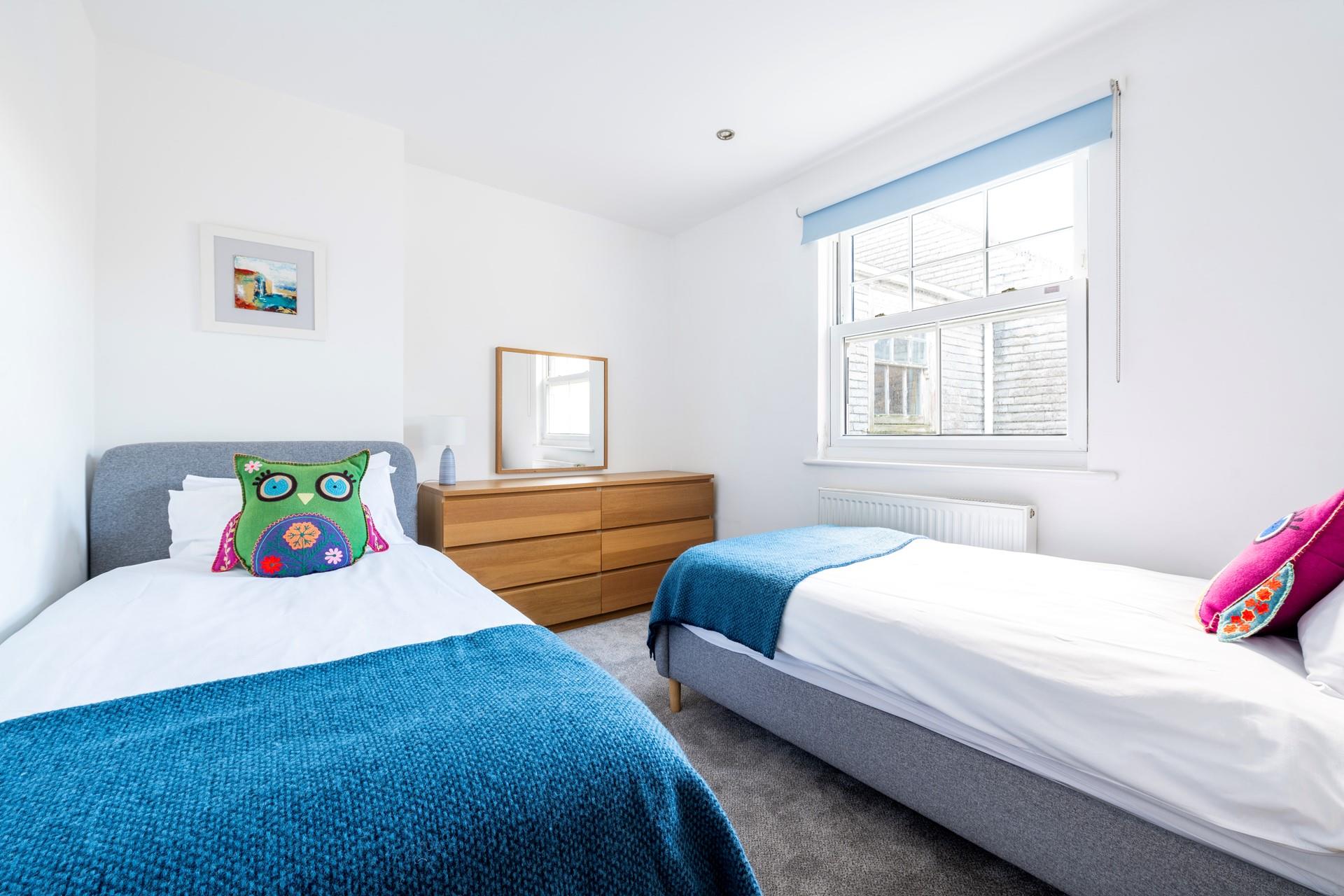 We love the cute owl cushions in bedroom 1!