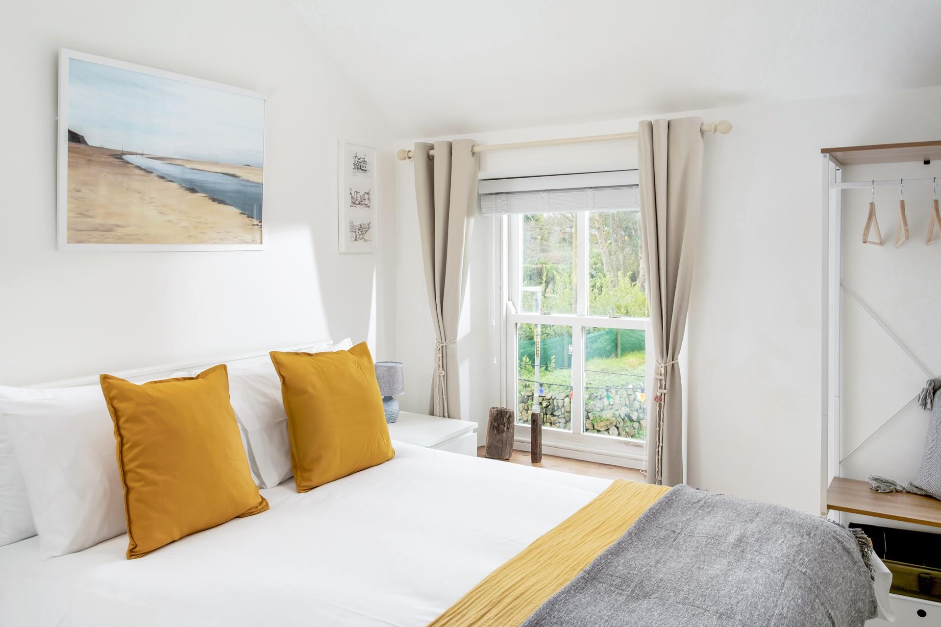 Sink into the soft sheets of the king size bed and drift off for a dreamy night's sleep.