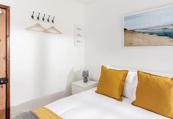 The yellow decor perfectly reflects that the cottage is just one mile from the beach!