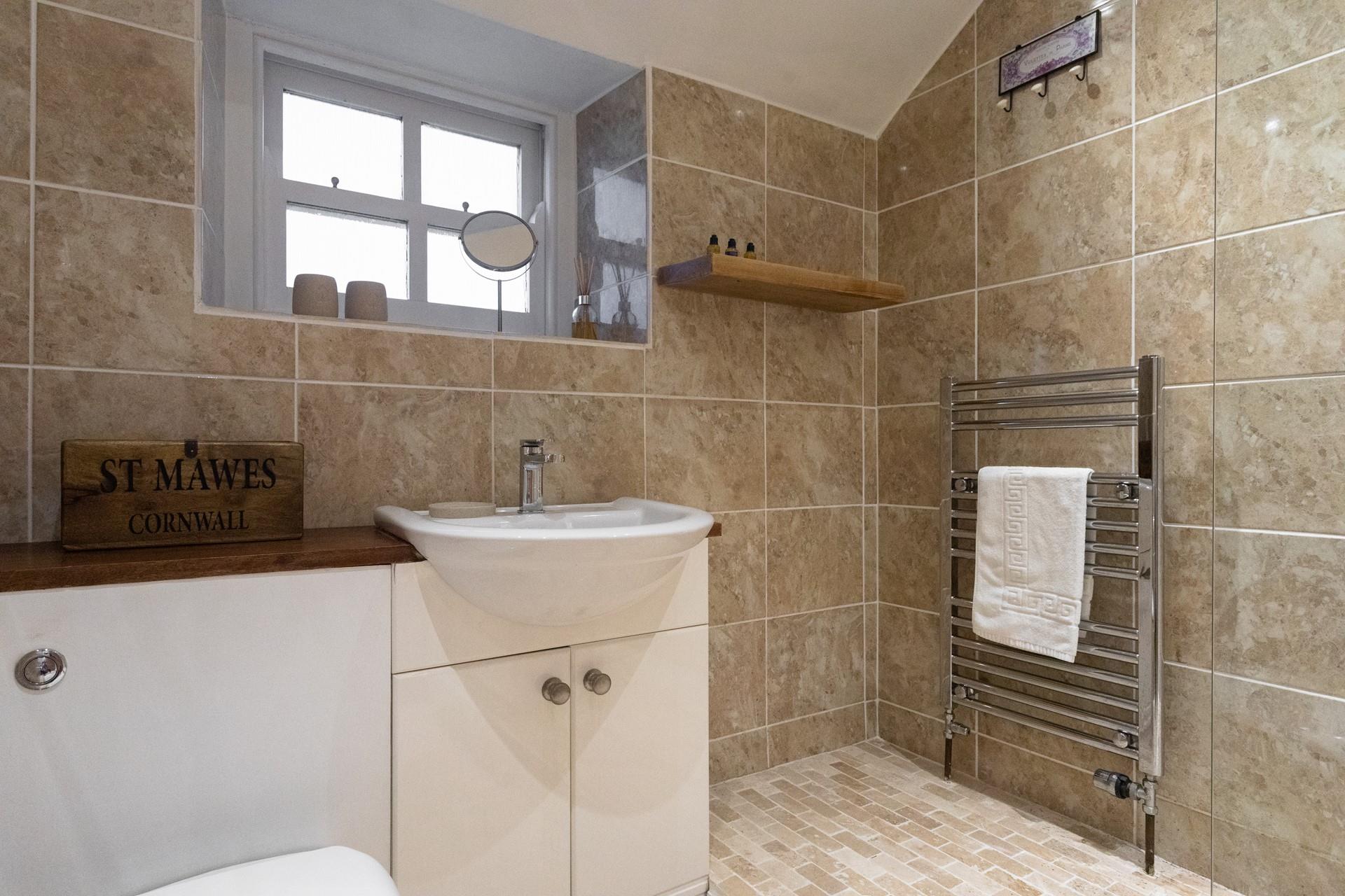 Get ready for the day in the stylish bathroom.