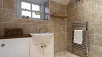 Get ready for the day in the stylish bathroom.