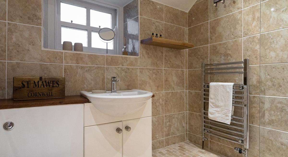 Get ready for the day in the stylish bathroom.