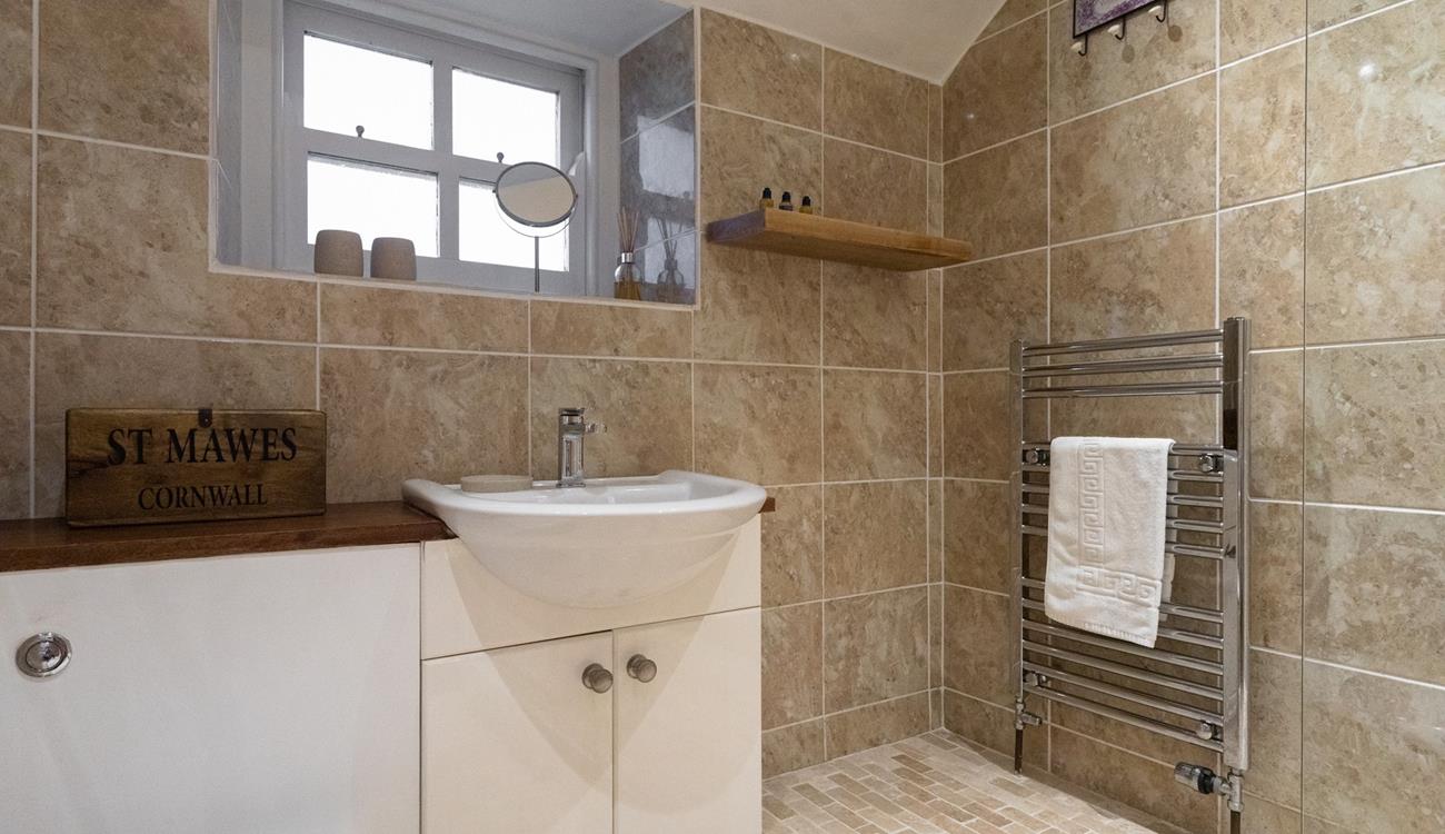 Get ready for the day in the stylish bathroom.